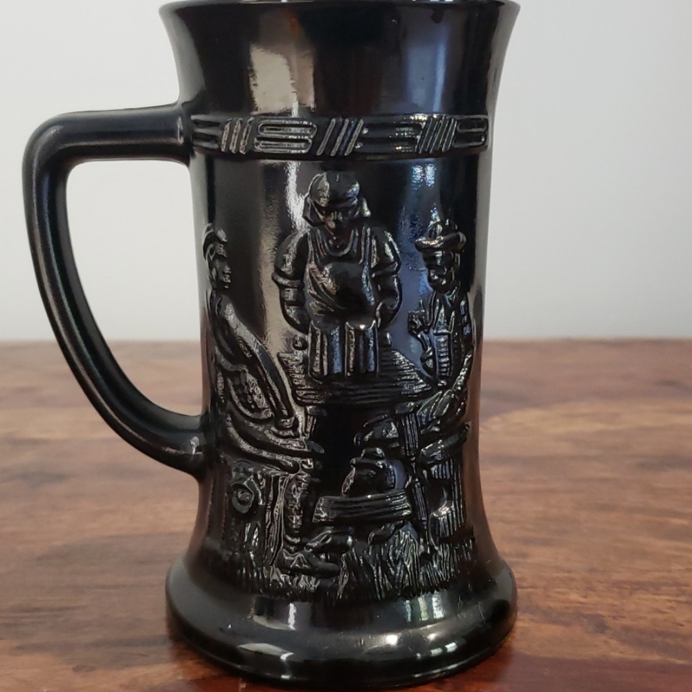 Vintage black Tiara glass beer stein.